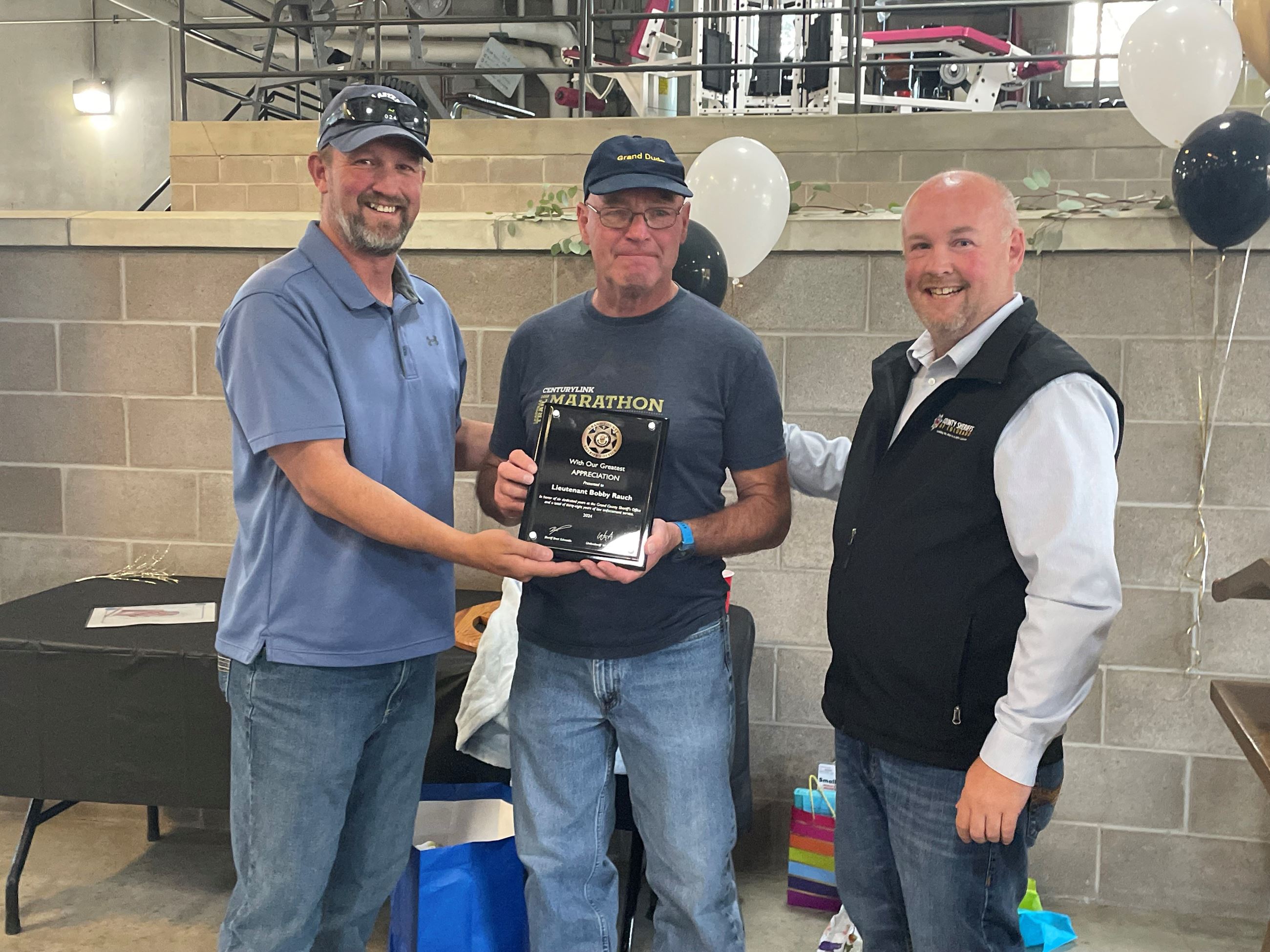 Lieutenant Bobby Rauch Receiving a Plaque of Appreciation for His Years of Service 10-2-2024